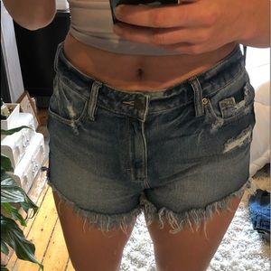 Denim shorts with fringe